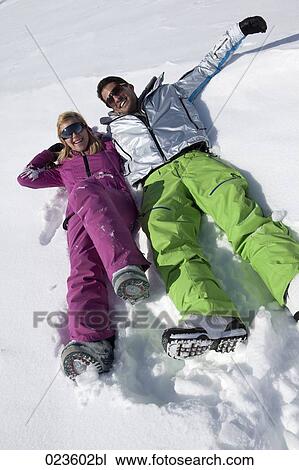 Stock Image - portrait of young couple in the mountains. Fotosearch