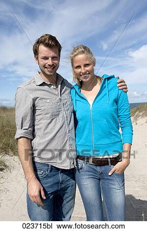 portrait of young couple on the beach View Large Photo Image Stock Image - portrait of young couple on the beach. Fotosearch