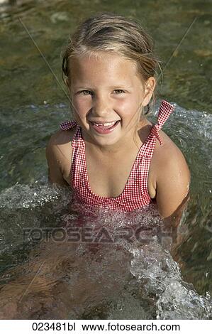portrait of young girl in water View Large Photo Image Stock Image - portrait of young girl in water. Fotosearch