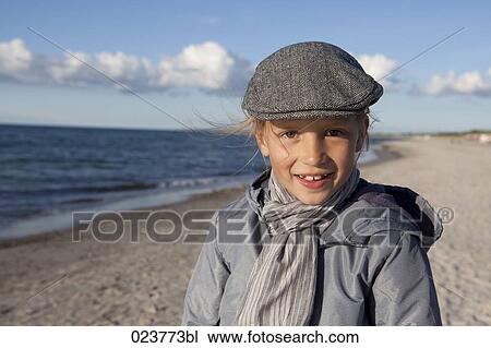 portrait of young girl on beach View Large Photo Image Stock Image - portrait of young girl on beach. Fotosearch