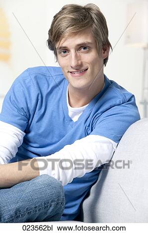 portrait of young man at home View Large Photo Image Stock Image - portrait of young man at home. Fotosearch