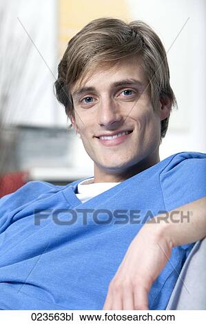 portrait of young man at home View Large Photo Image Stock Image - portrait of young man at home. Fotosearch