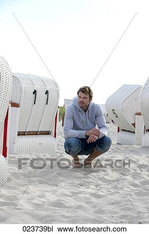 portrait of young man on beach View Large Photo Image Stock Image - portrait of young man on beach. Fotosearch