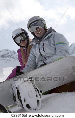 portrait of young snowboarder couple View Large Photo Image Stock Image - portrait of young snowboarder couple. Fotosearch