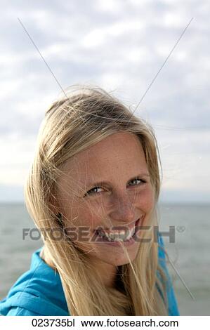 portrait of young woman on the beach View Large Photo Image Stock Image - portrait of young woman on the beach. Fotosearch
