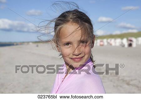 portrait og young girl on beach View Large Photo Image Stock Image - portrait og young girl on beach. Fotosearch