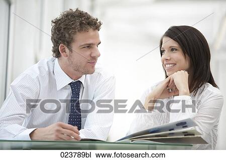 portrait young businesswoman and male colleague View Large Photo Image Stock Image - portrait young businesswoman and male colleague. Fotosearch