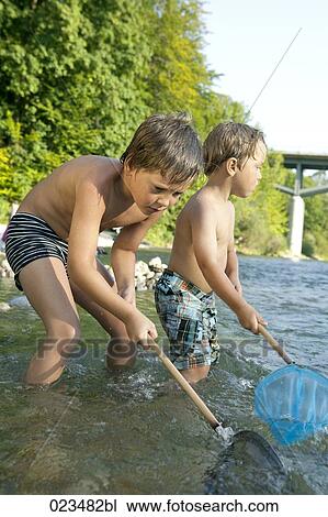 two young boys fishing View Large Photo Image Stock Image - two young boys fishing. Fotosearch