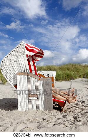 young couple relaxing in beach chair View Large Photo Image Stock Image - young couple relaxing in beach chair. Fotosearch