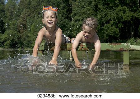 young girl and boy having fun in summer View Large Photo Image Stock Image - young girl and boy having fun in summer. Fotosearch