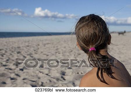 young girl on beach View Large Photo Image Stock Image - young girl on beach. Fotosearch
