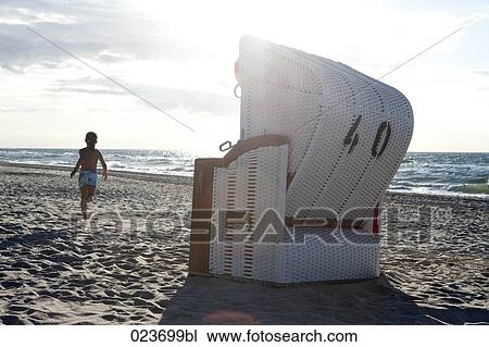 young girl running on beach at sunset View Large Photo Image Stock Image - young girl running on beach at sunset. Fotosearch