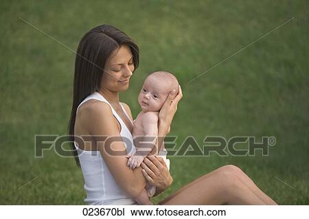 young mother with baby boy View Large Photo Image Stock Image - young mother with baby boy. Fotosearch