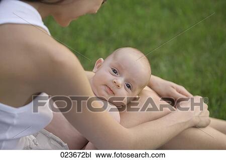 young mother with baby boy View Large Photo Image Stock Image - young mother with baby boy. Fotosearch