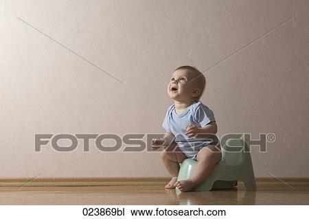 baby boy sitting on potty View Large Photo Image Stock Image - baby boy sitting on potty. Fotosearch