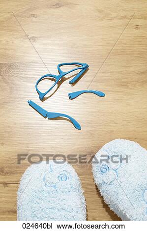 Stock Image - broken glasses lying on floor. Fotosearch