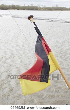Stock Image - close-up of german flag on ship. Fotosearch