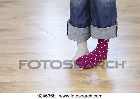 detail of woman wearing different socks View Large Photo Image Stock Image - detail of woman wearing different socks. Fotosearch