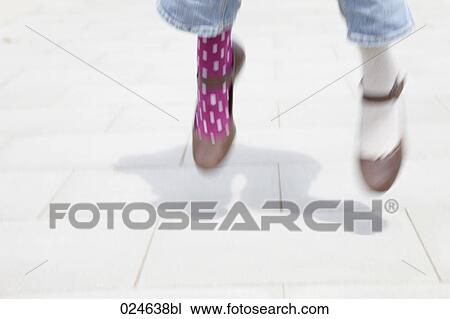 detail of woman wearing different socks View Large Photo Image Stock Image - detail of woman wearing different socks. Fotosearch
