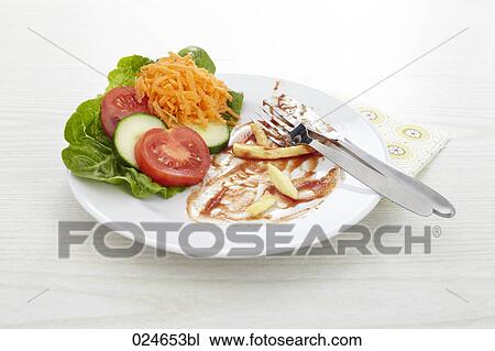 half eaten plate with mixed salad and chips View Large Photo Image Stock Image - half eaten plate with mixed salad and chips. Fotosearch