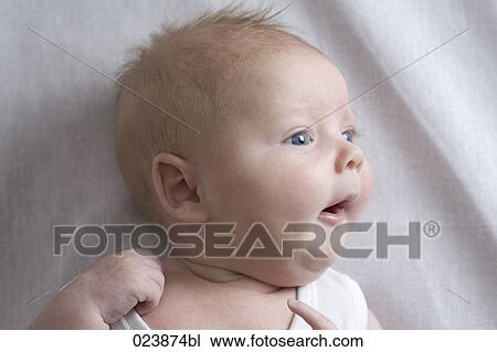 Stock Image - headshot of young baby boy. Fotosearch