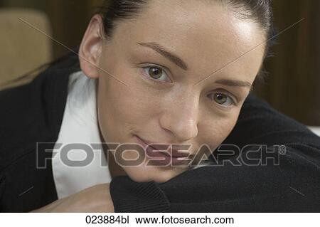 Stock Image - headshot of young businesswoman. Fotosearch