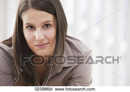 headshot of young businesswoman View Large Photo Image Stock Image - headshot of young businesswoman. Fotosearch