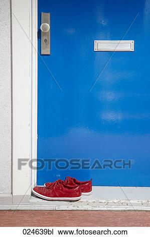 pair of red sneaker at door outside apartment View Large Photo Image Stock Image - pair of red sneaker at door outside apartment. Fotosearch