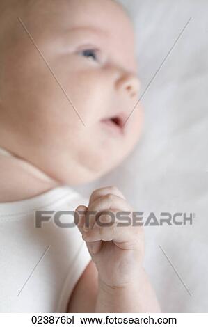 Stock Image - portrait of young baby boy. Fotosearch