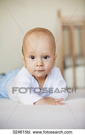 Stock Image - portrait of young baby boy. Fotosearch