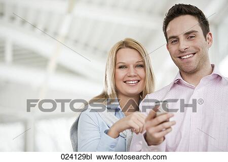 portrait of young businessman and female colleague View Large Photo Image Stock Image - portrait of young businessman and female colleague. Fotosearch