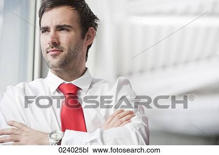 Stock Image - portrait of young businessman. Fotosearch