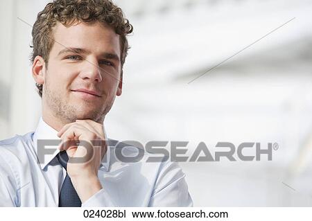 portrait of young businessman View Large Photo Image Stock Image - portrait of young businessman. Fotosearch