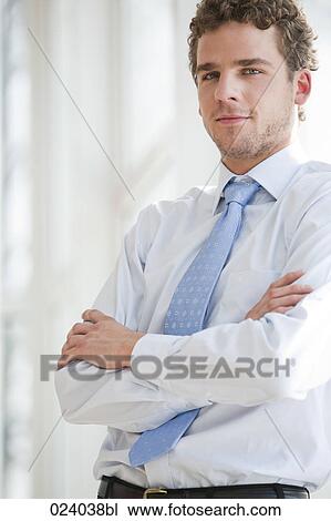 Stock Image - portrait of young businessman. Fotosearch
