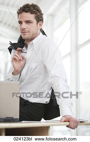 portrait of young businessman View Large Photo Image Stock Image - portrait of young businessman. Fotosearch
