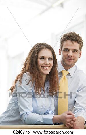 portrait of young businesswoman and male colleague View Large Photo Image Stock Image - portrait of young businesswoman and male colleague. Fotosearch