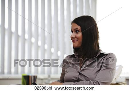 portrait of young businesswoman at desk View Large Photo Image Stock Image - portrait of young businesswoman at desk. Fotosearch