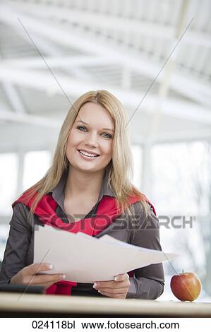 portrait of young businesswoman at desk View Large Photo Image Stock Image - portrait of young businesswoman at desk. Fotosearch