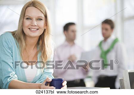 portrait of young businesswoman holding cup View Large Photo Image Stock Image - portrait of young businesswoman holding cup. Fotosearch