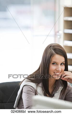 Stock Image - portrait of young businesswoman. Fotosearch