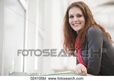 Stock Image - portrait of young businesswoman. Fotosearch