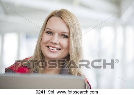 Stock Image - portrait of young businesswoman. Fotosearch