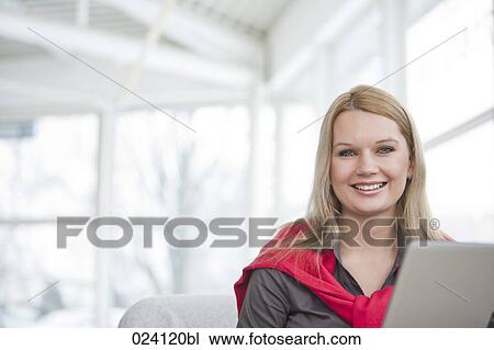 Stock Image - portrait of young businesswoman. Fotosearch