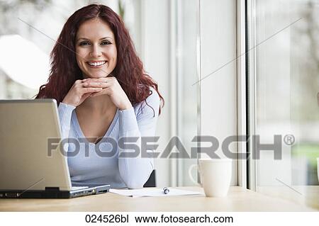 portrait of young businesswoman with laptop computer View Large Photo Image Stock Image - portrait of young businesswoman with laptop computer. Fotosearch