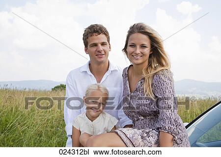 portrait of young family at car View Large Photo Image Stock Image - portrait of young family at car. Fotosearch
