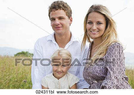 Stock Image - portrait of young family. Fotosearch