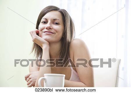portrait of young woman with cup View Large Photo Image Stock Image - portrait of young woman with cup. Fotosearch