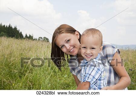 portrait of young woman with her son View Large Photo Image Stock Image - portrait of young woman with her son. Fotosearch