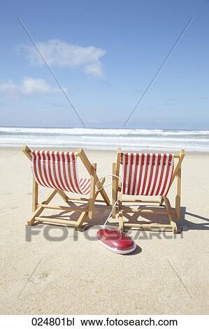 computer mouse and sun loungers on sandy beach View Large Photo Image Stock Image - computer mouse and sun loungers on sandy beach. Fotosearch