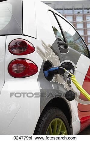 electric car being recharged View Large Photo Image Stock Image - electric car being recharged. Fotosearch